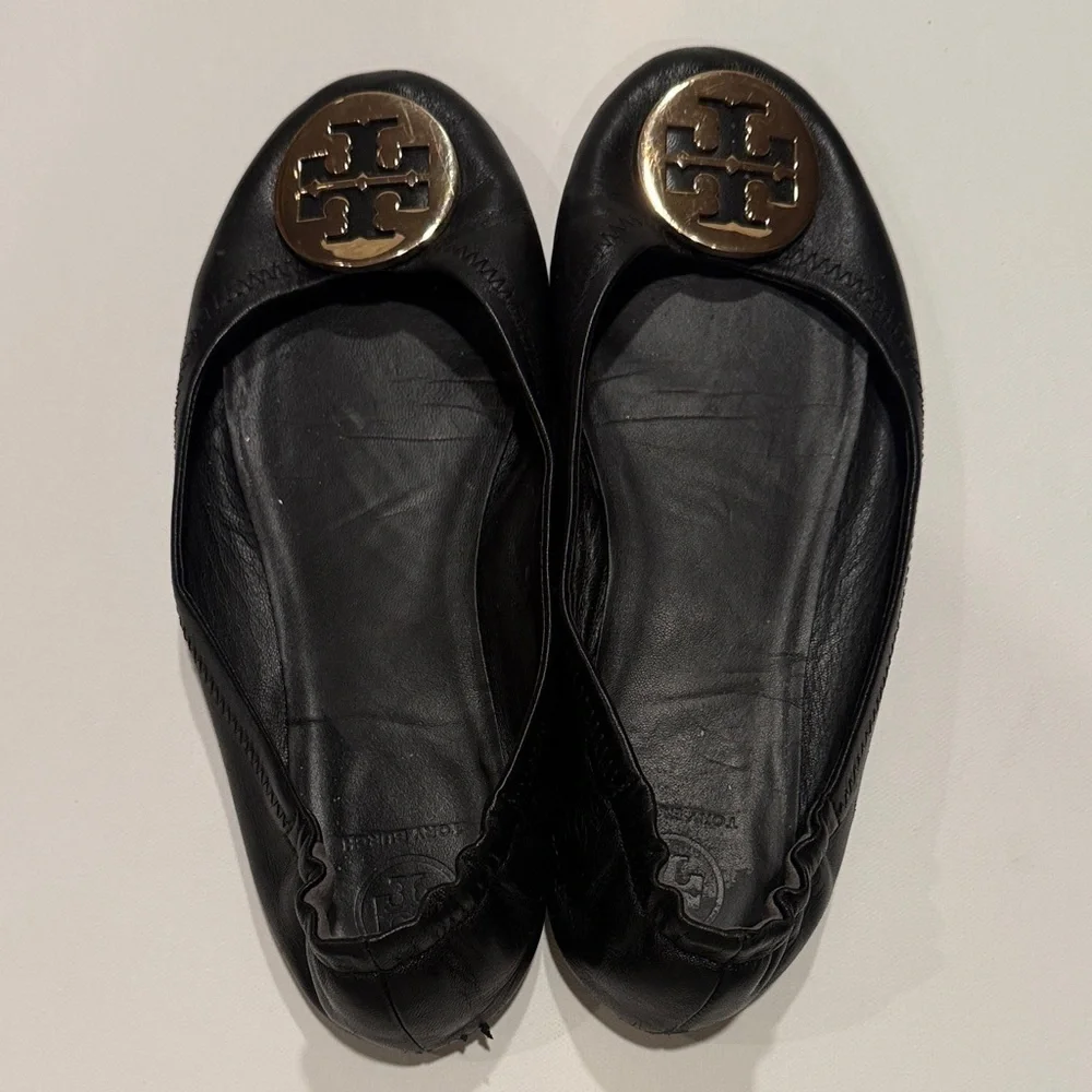 Tory Burch Black Flats with Gold Emblem